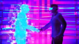 2 Personen mit VR-Brillen geben sich in einer virtuellen Welt die Hand.